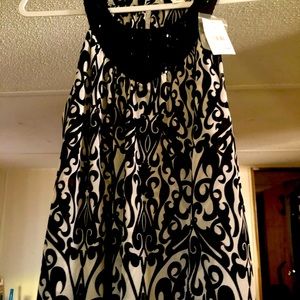 Ladies Dressy top ... black and white with an embellished collar ... Cato .. L